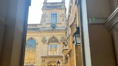 Arch way of college, looking out to the chapel