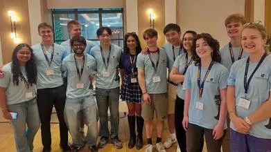 A group of Trinity College Ambassadors in the Levine Cafe
