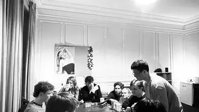 Members of the Poker society sat around a table playing Poker