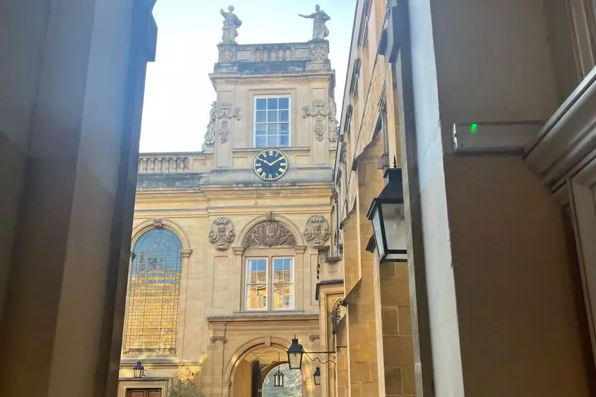 Arch way of college, looking out to the chapel